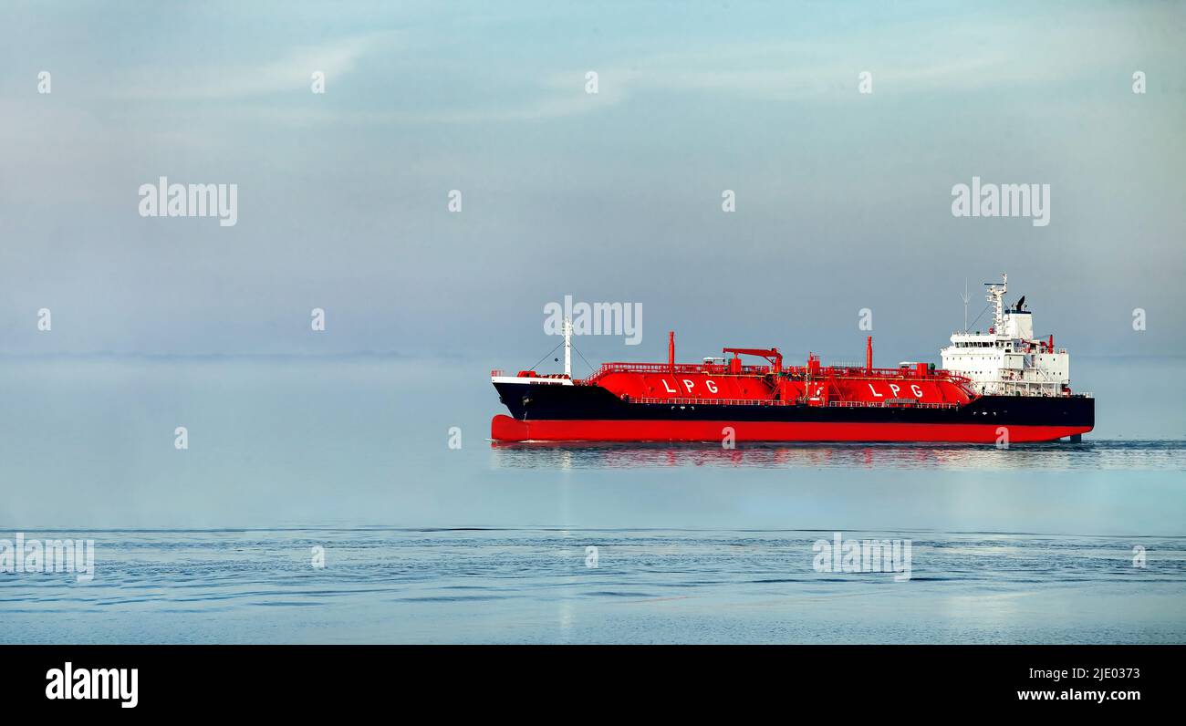 Side view oil and gas petrochemical tanker offshore in opensea, Refinery industry cargo ship, Oil product tanker and LPG tanker at sea view from above Stock Photo