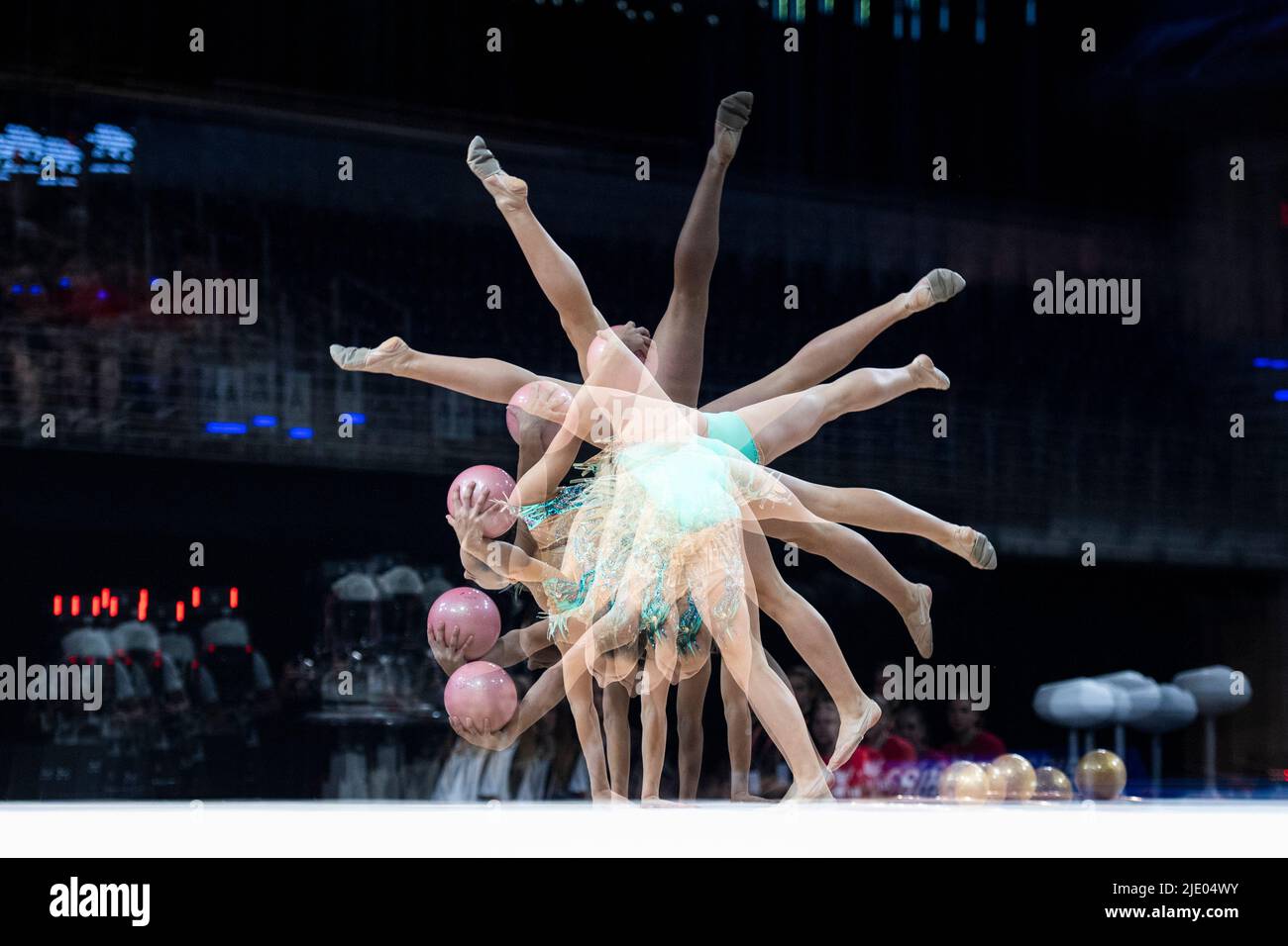 Berlin, Germany. 24th June, 2022. Gymnastics: German Championship, rhythmic gymnastics individual - all-around. Pauline Köhler during her freestyle with the ball. (Effect by multiple exposure) Credit: Christophe Gateau/dpa/Alamy Live News Stock Photo