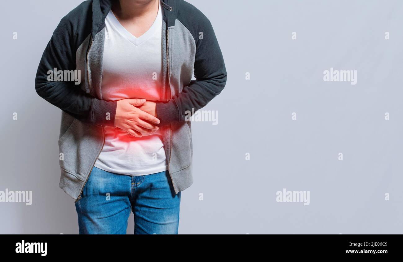 People with stomach pain, stomach problems concept, man with digestive problems, man with stomach pain, isolated Stock Photo