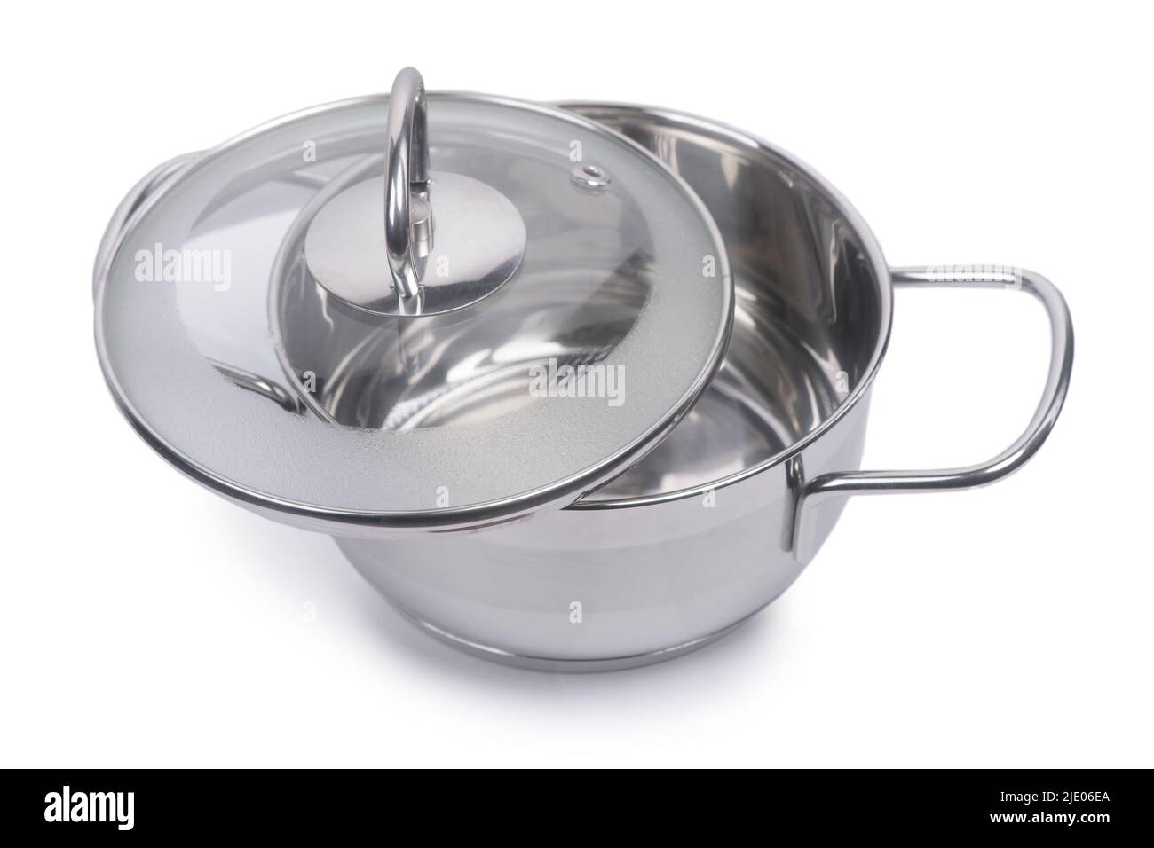 Stainless steel pan with glass lid isolated on white background Stock Photo