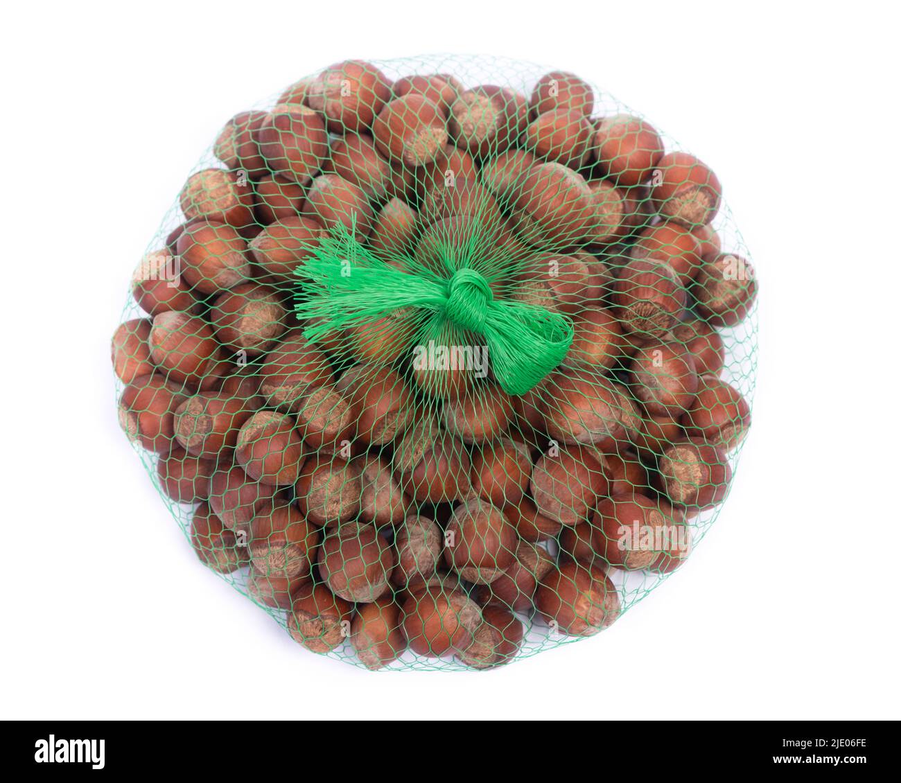 String bag with hazelnuts isolated over the white background Stock Photo