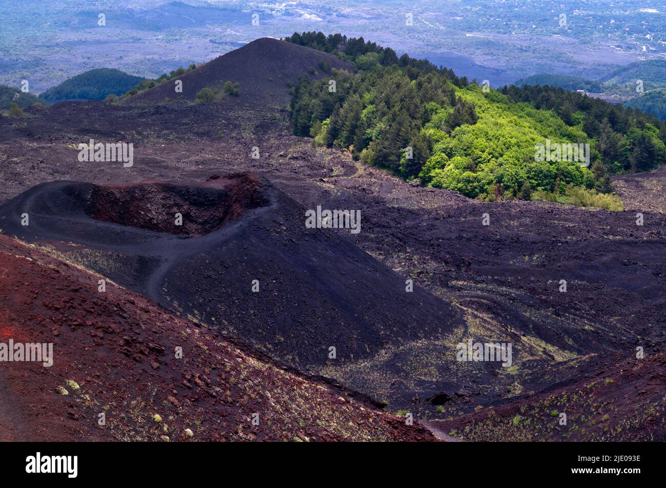 View of red lava rocks, volcanic soil, Crateri crater Silvestri, Etna volcano, Sicily, Italy Stock Photo