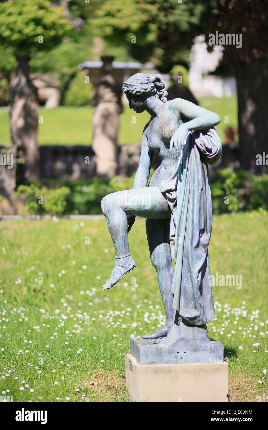 Bronze sculpture of the sandal-solving Venus, Municipal Lapidarium, State Capital Stuttgart, Baden-Wuerttemberg, Germany Stock Photo