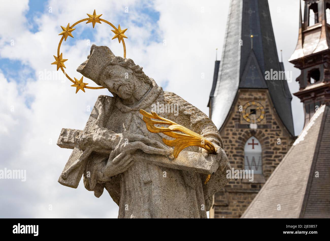 Nepomuk statue on the main square with town parish church, Bad Leonfelden, Muehlviertel region, Upper Austria, Austria Stock Photo