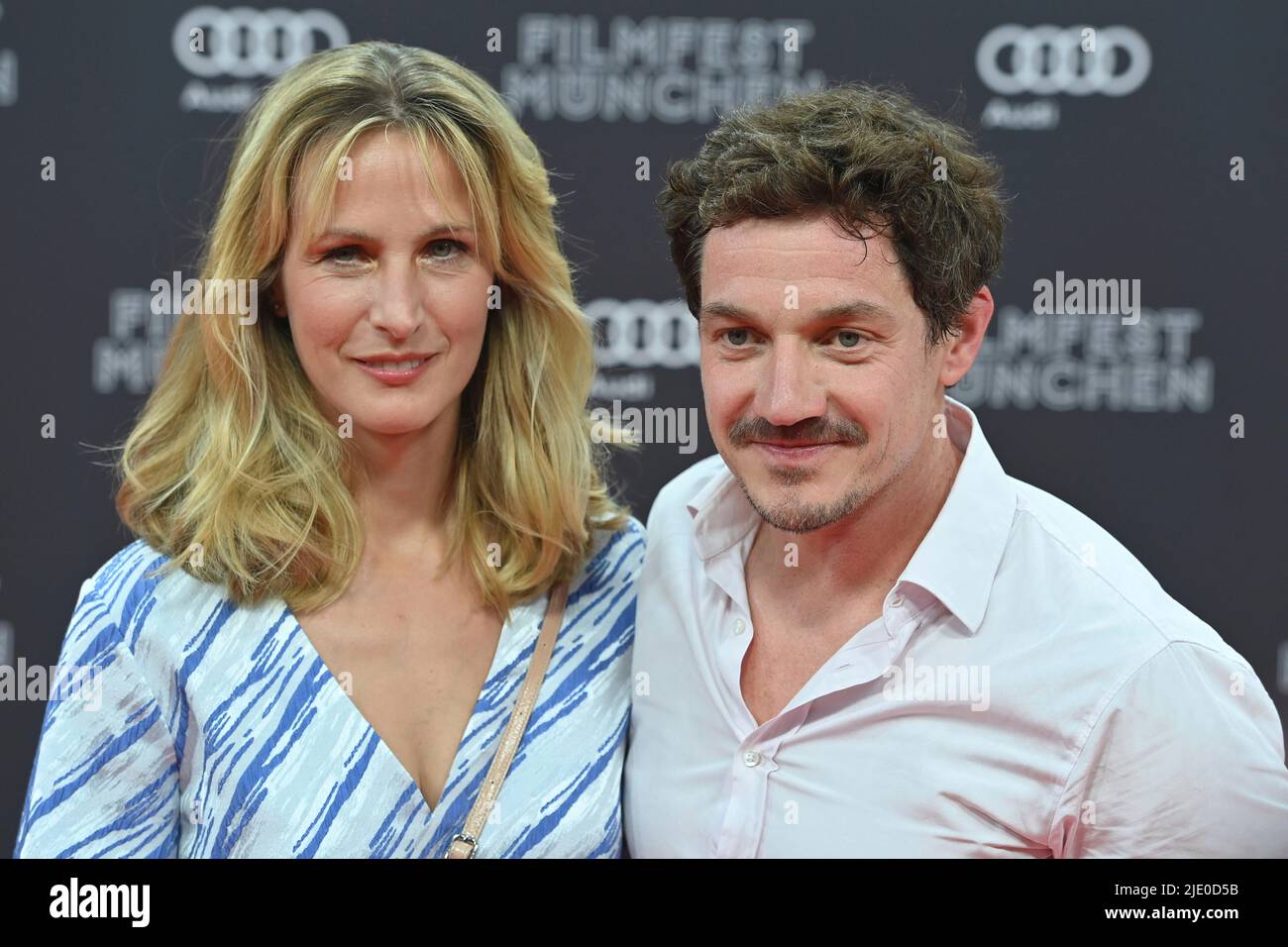 Markus BRANDL (actor) with wife Nathalie SCHOTT. Red Carpet, Red Carpet, Opening 39th Filmfest Muenchen on 06/23/2022.Gasteig HP8. Stock Photo