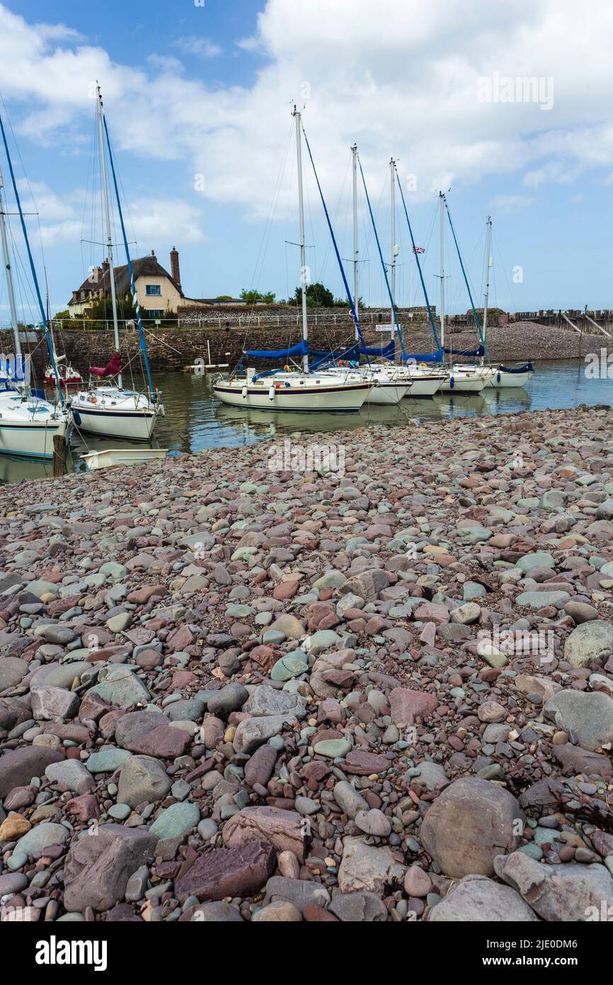 Porlock Weir,  a small port in the Exmoor National Park, Somerset, England. The harbour, with sailing boats moored. Stock Photo