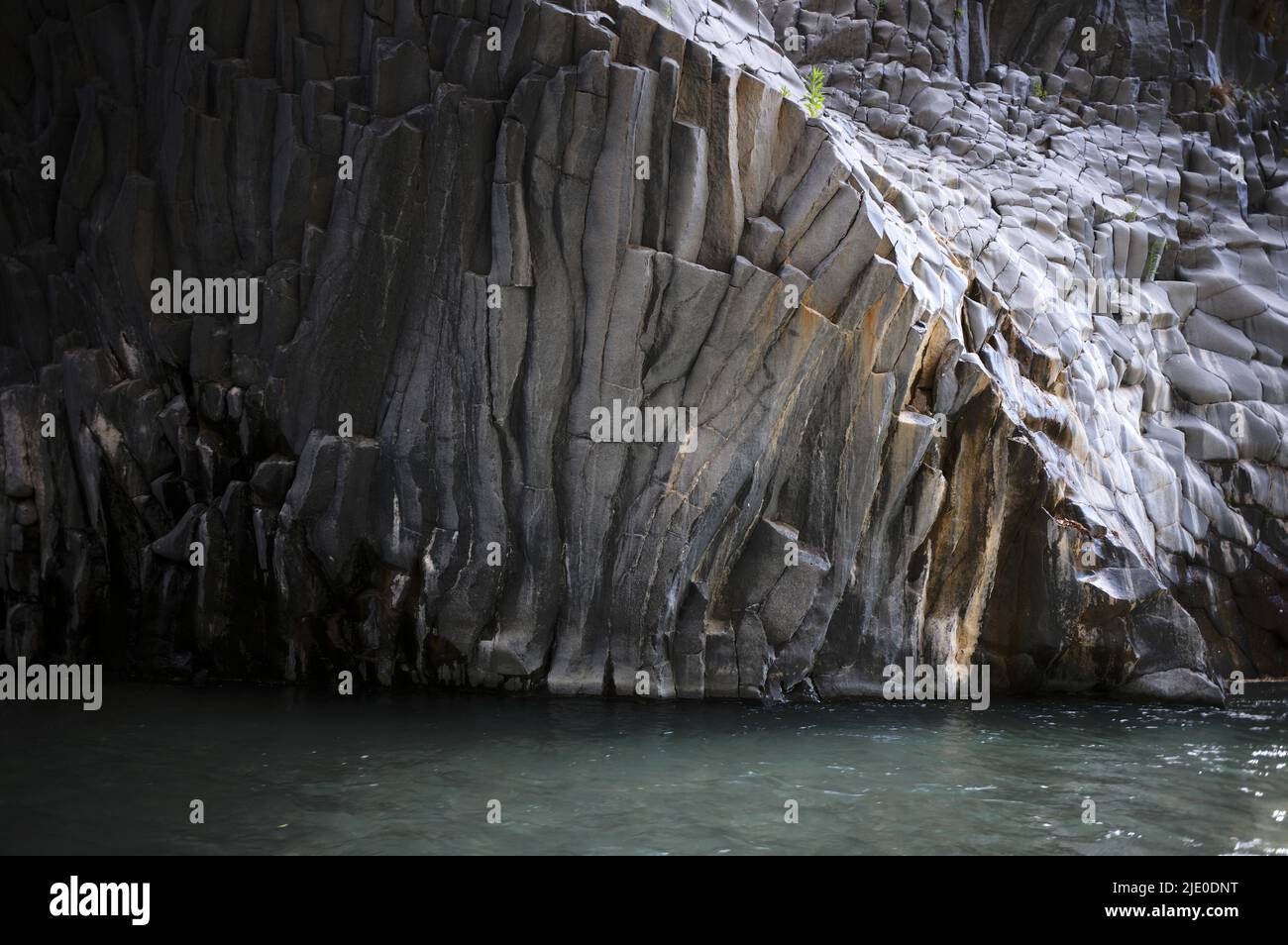 Lava rock in the river park Gole dell' Alcantara, Alcantara Gorge, Sicily, Italy Stock Photo