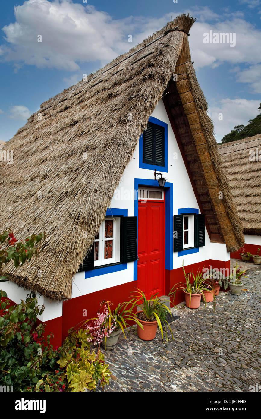 Casa de Como, thatched house, stone house, gable roof, steep, reaching to the ground, house with thatched roof, thatched roof, small, colourful Stock Photo