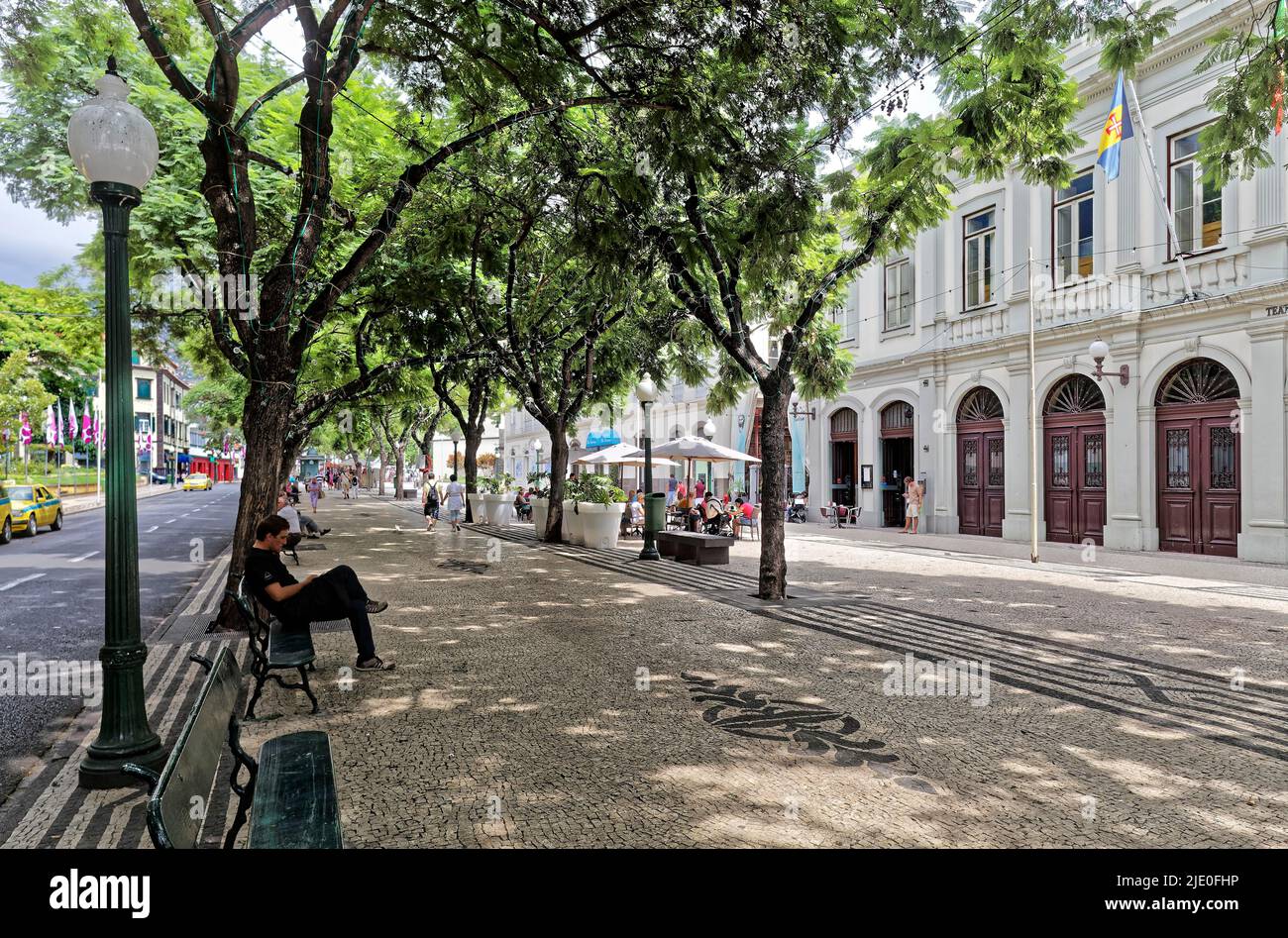 Promenade, avenue with benches and cobblestones, passers-by, on the right municipal theatre Teatro Municipal Baltazar Dias from 1888, Avenida Stock Photo