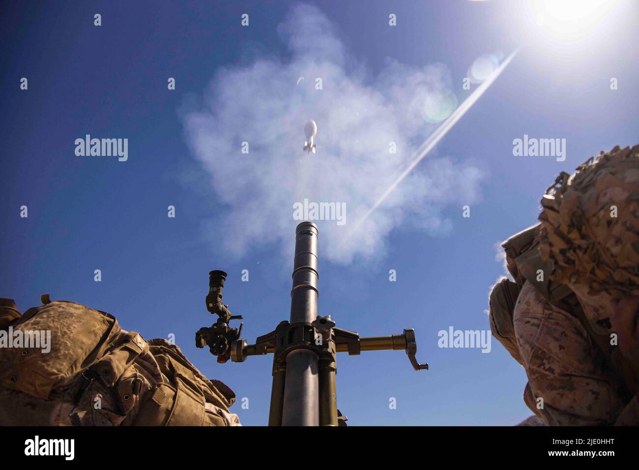 Twentynine Palms, California, USA. 12th May, 2022. U.S. Marines with Charlie Company, 1st Battalion, 7th Marine Regiment, 1st Marine Division fire a 60 mm mortar system during a digital kill chain exercise at Marine Corps Air Ground Combat Center, Twentynine Palms, California, May 12, 2022. During the exercise, the Marines tested new digital target acquisition equipment for the 60 mm mortar system and the Mark 19 40 mm grenade machine gun. Credit: U.S. Marines/ZUMA Press Wire Service/ZUMAPRESS.com/Alamy Live News Stock Photo