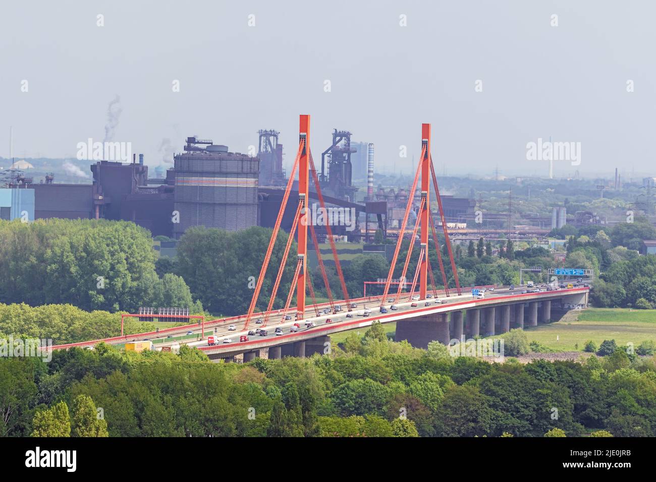 Editorial: MOERS, NORTH RHINE-WESTPHALIA, GERMANY, MAY 14, 2022 - Highway bridge over the Rhine near Moers, seen from the Halde Rheinpreussen with hea Stock Photo