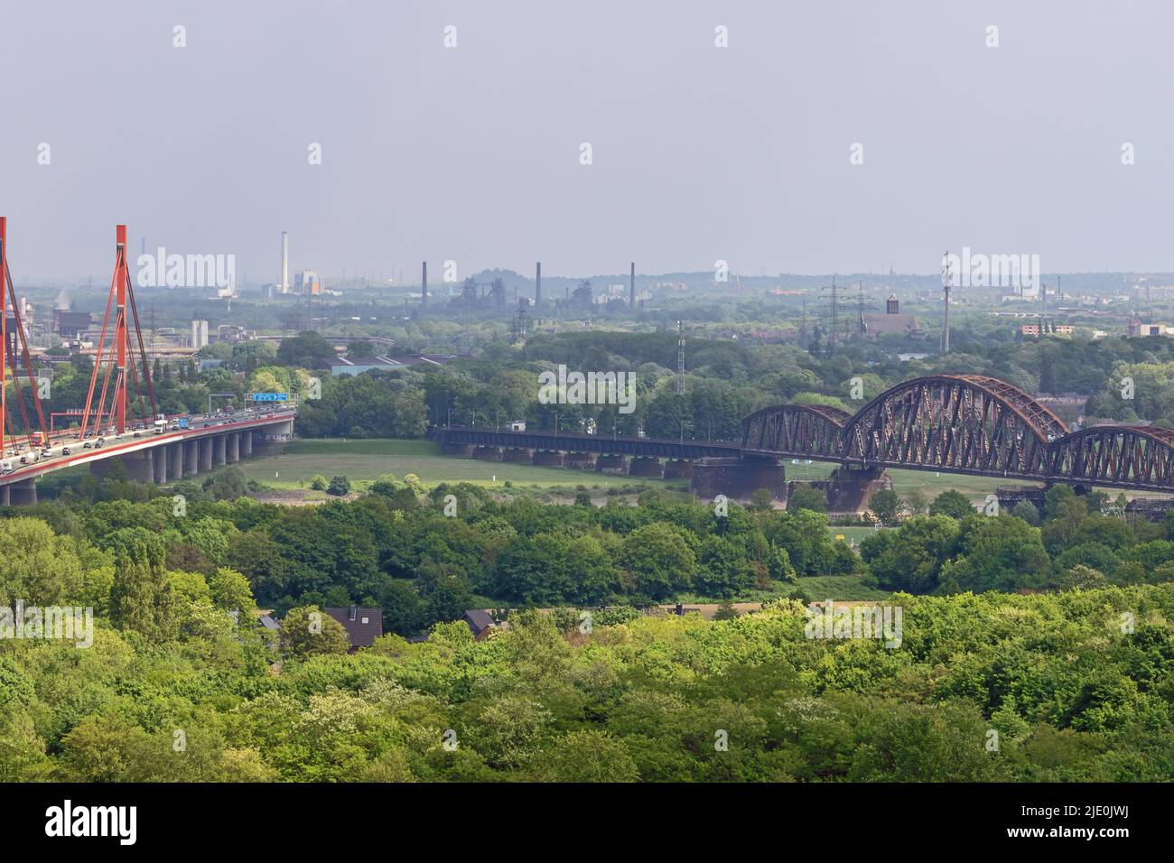 Editorial: MOERS, NORTH RHINE-WESTPHALIA, GERMANY, MAY 14, 2022 - Close up of highway and railway bridges over the Rhine, seen from the Halde Rheinpre Stock Photo