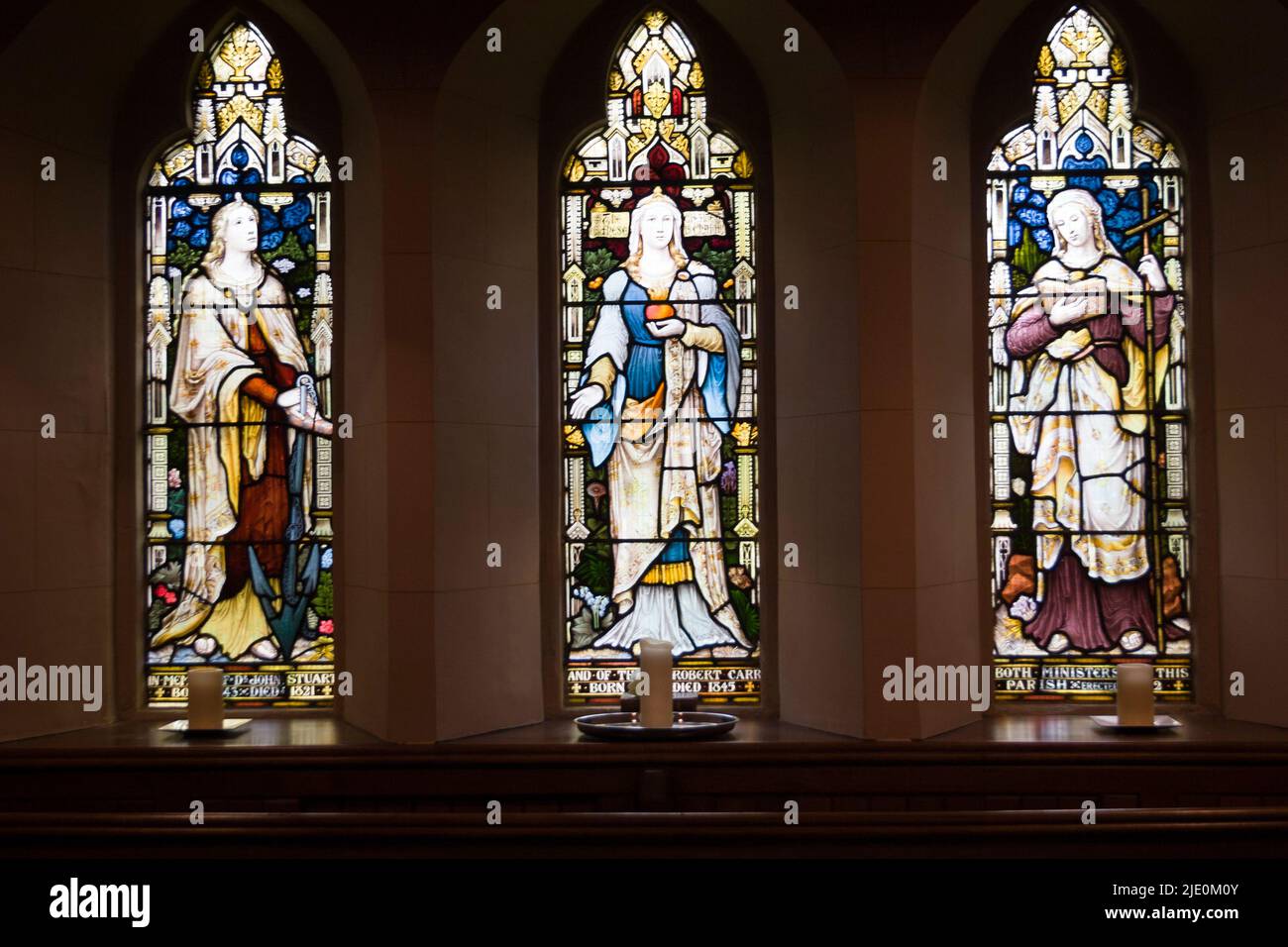 Stained glass window of Faith, Hope and Charity in Luss Parish Church, Scotland Stock Photo