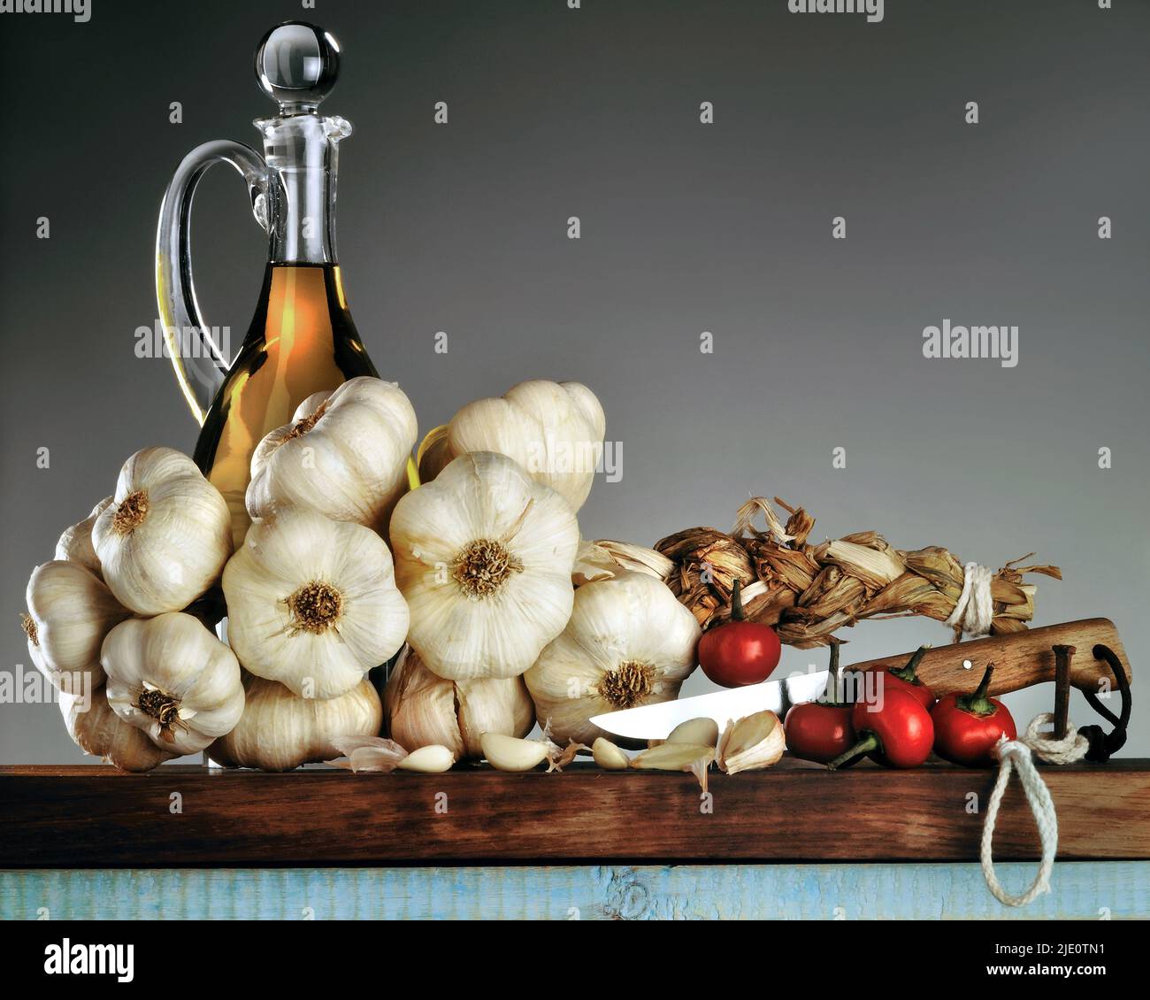 Still life, Food and wine, garlic, olive oil and chili pepper Stock Photo Alamy
