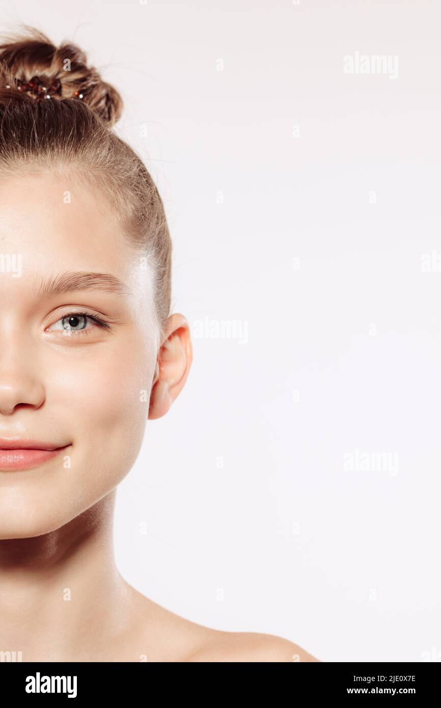 Adorable young woman with well-kept young skin and without makeup ...