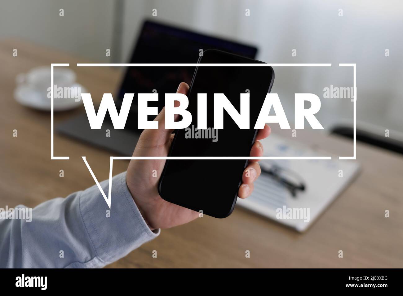 WEBINAR hand on table use E-business Browsing Connection in computer, coffee break in classroom to use cloud communication Stock Photo