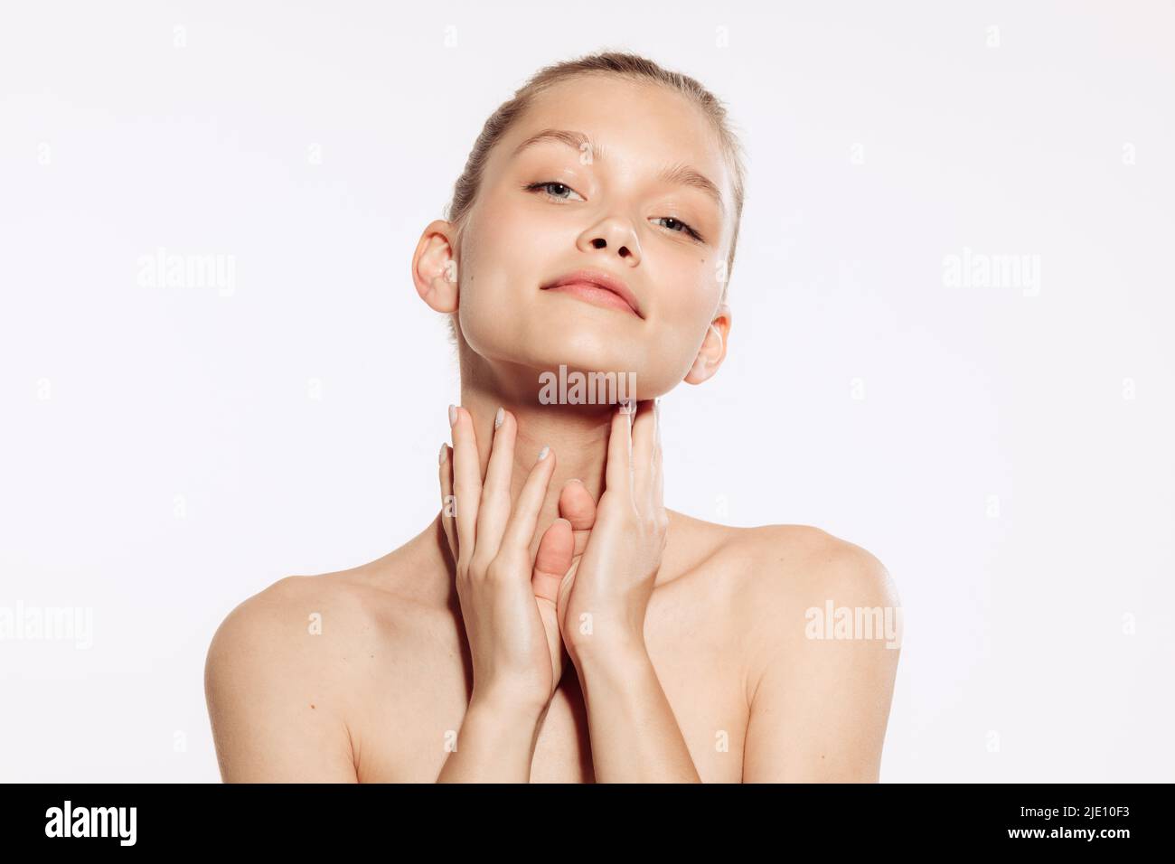 Adorable young woman with well-kept young skin and without makeup ...