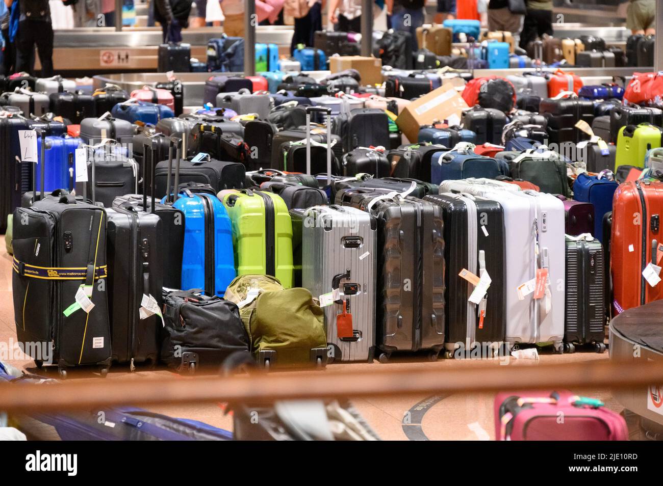 Hamburg, Germany. 23rd June, 2022. Numerous suitcases are stored in the  baggage claim area. Hundreds of suitcases, bags and baby carriages are  still piled up in the baggage claim area of the