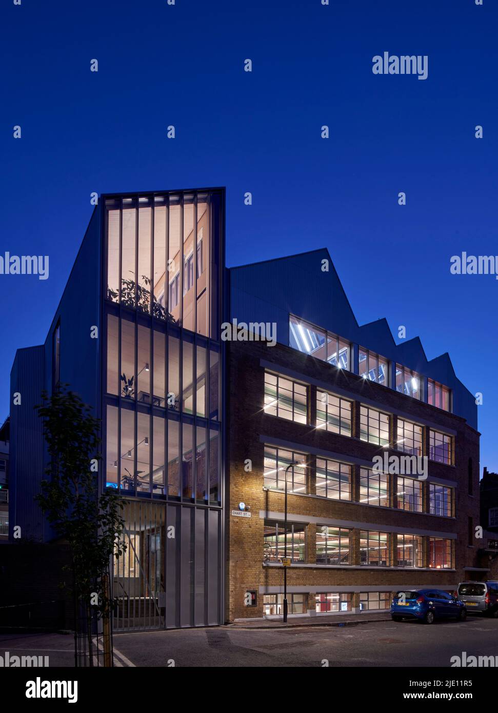 Dusk view from street. 16 Chart Street Engineers Office, London, United Kingdom. Architect: Ian Chalk Architects , 2022. Stock Photo