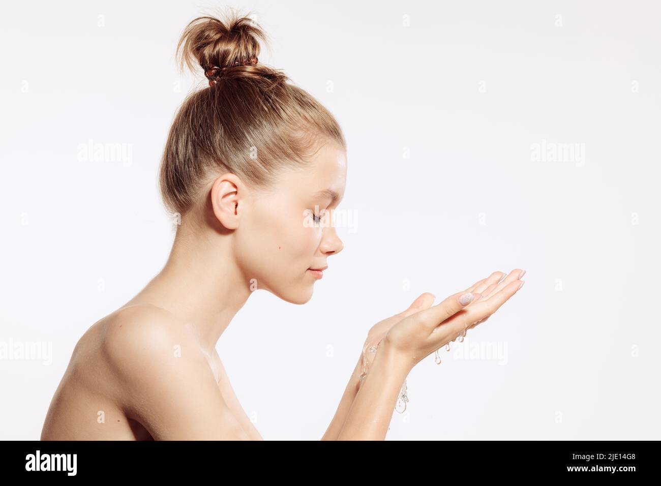 Adorable young woman with well-kept young skin and without makeup ...