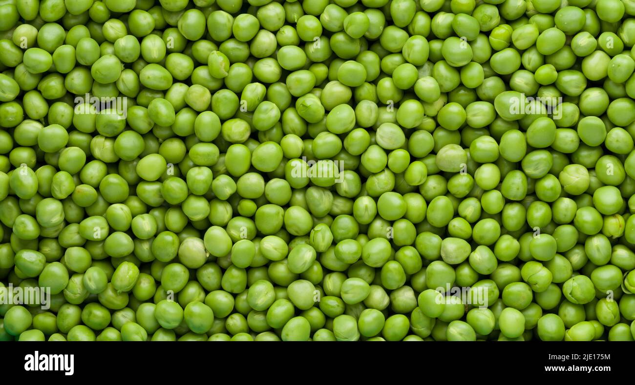 Green peas top view. Food background. Pea pods from farmland. Pea was