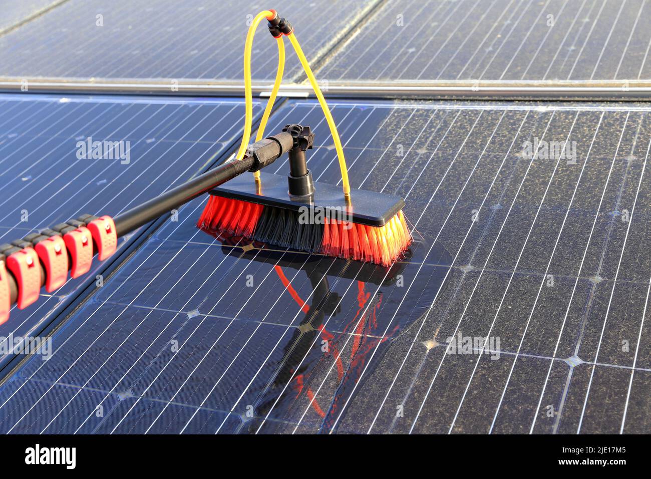 Gentle cleaning of solar modules with water Stock Photo