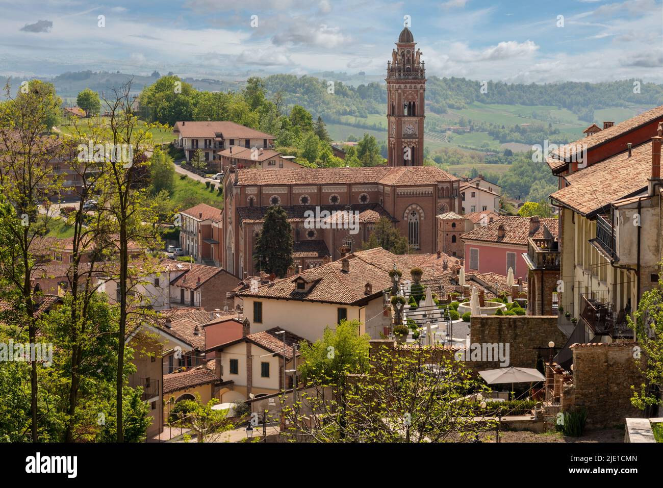 Monforte d'Alba, langhe, Italy: view of medieval village on the Langhe hills with the church Madonna della Neve (Madonna of the snow) on blue sky and Stock Photo