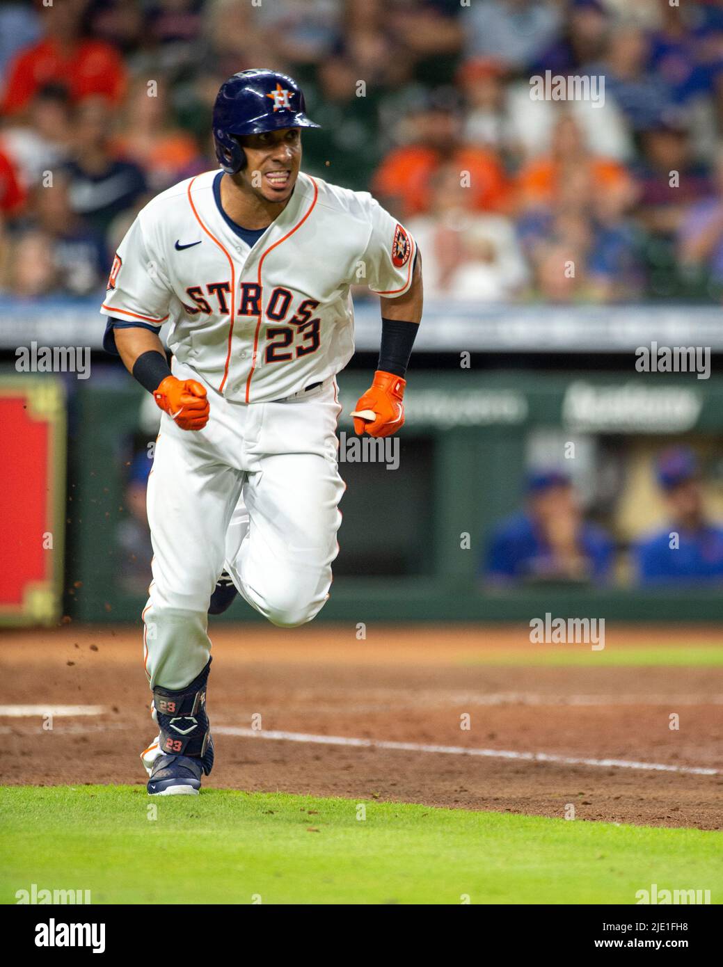 Houston Astros left fielder Michael Brantley (23) singles to right field in the bottom of the sixth inning of the MLB game between the Houston Astros Stock Photo