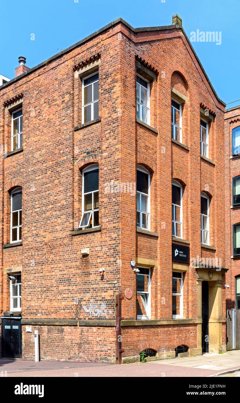 No.8 Great Marlborough Street, Manchester, UK.  Former warehouse on the site of the slum area known as Little Ireland.  Now used by the BIMM Institute Stock Photo