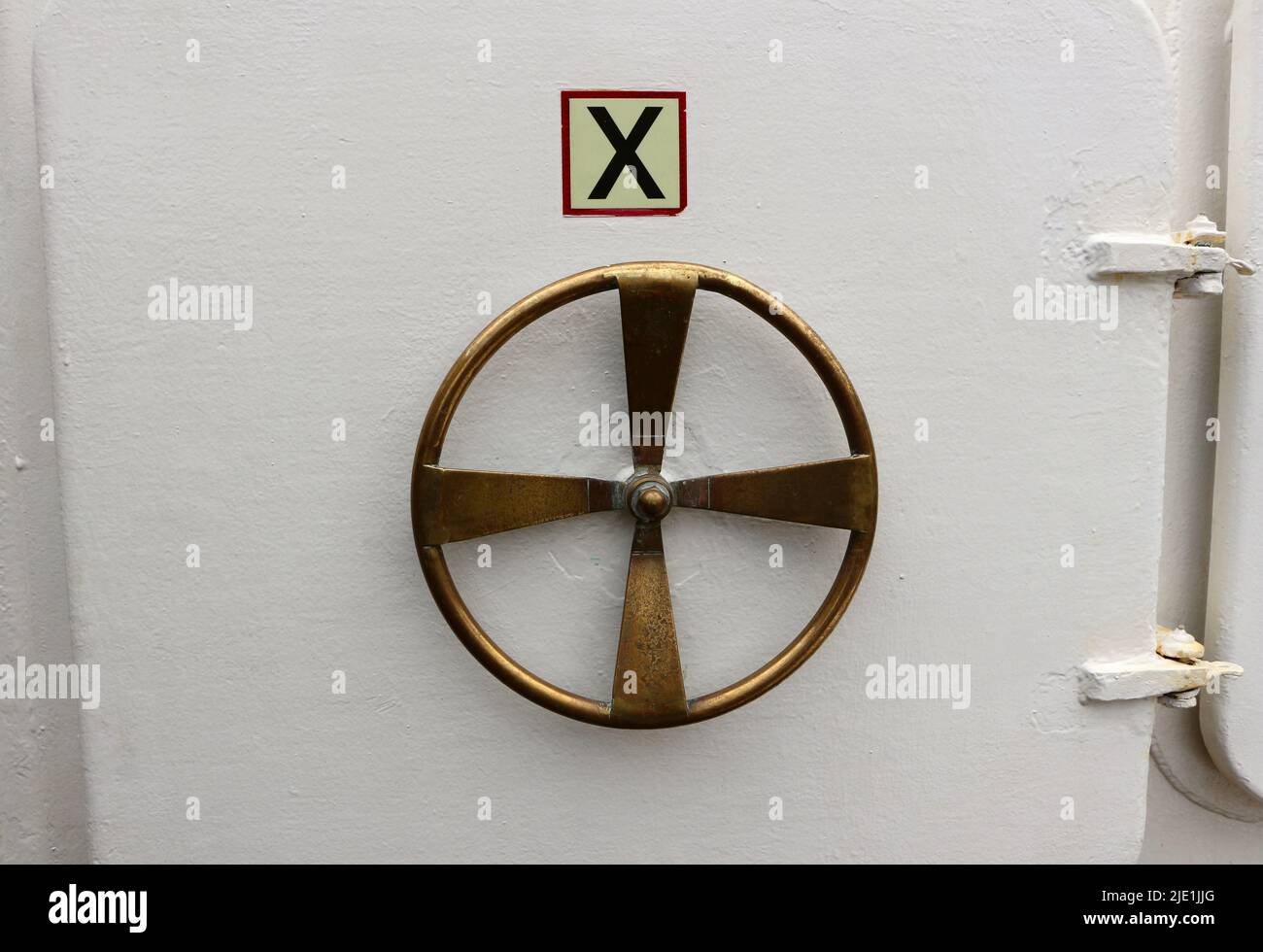 Brass wheel door mechanism on board the Elcano Spanish navy training