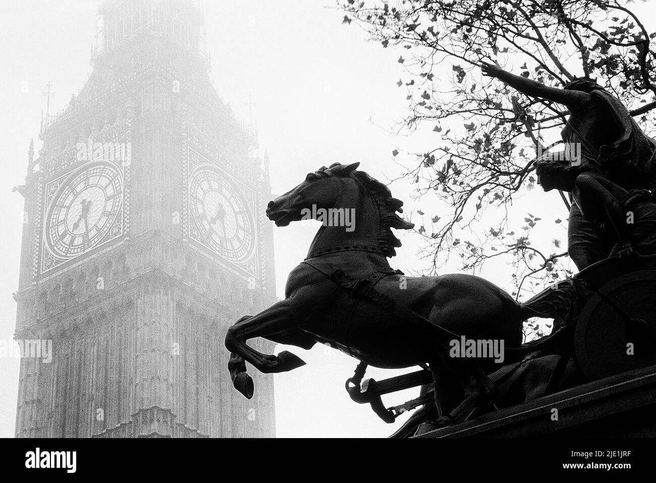 Foggy London. Big Ben. Elizabeth Tower. Palace of Westminster. Houses of Parliament. Boadicea and Her Daughters statue Stock Photo