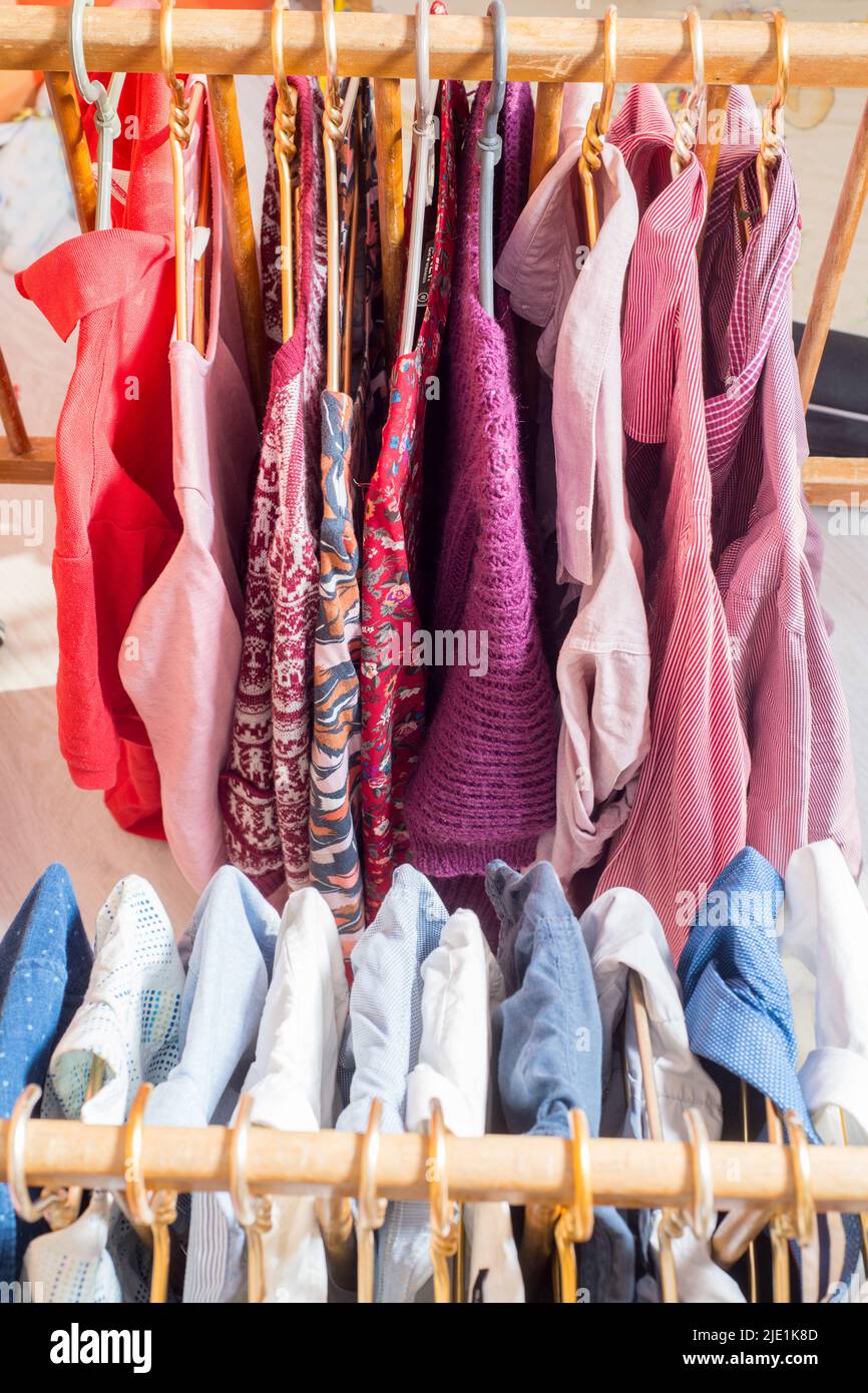 https://c8.alamy.com/comp/2JE1K8D/clothes-are-hanging-on-hangers-lots-of-clothes-for-sorting-things-in-the-wardrobe-2JE1K8D.jpg