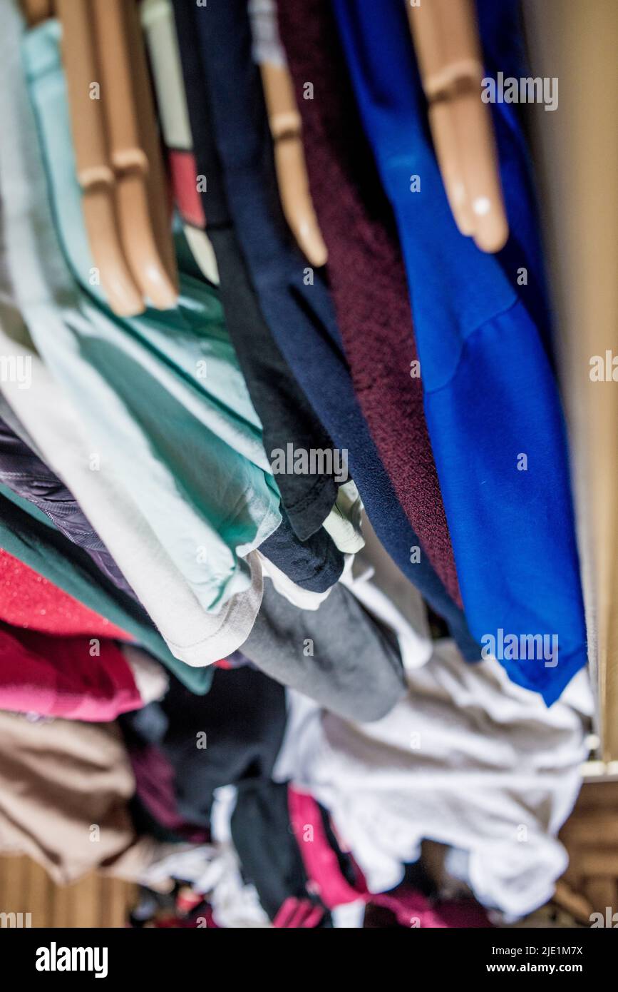 clothes weigh on the shoulders in the closet. Second hand Stock Photo Alamy