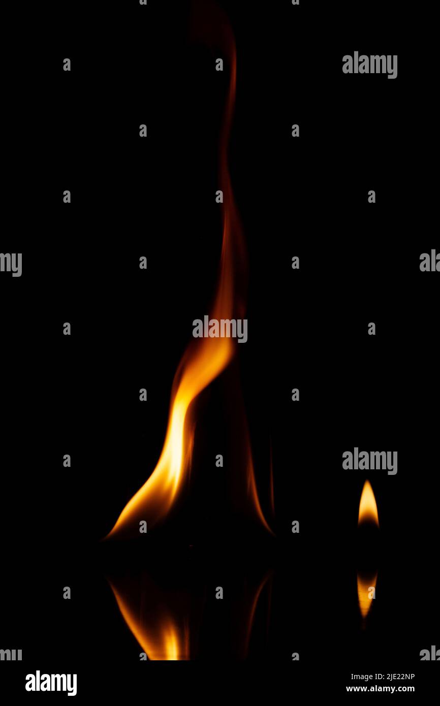 Fire flames isolated on a black background Stock Photo - Alamy