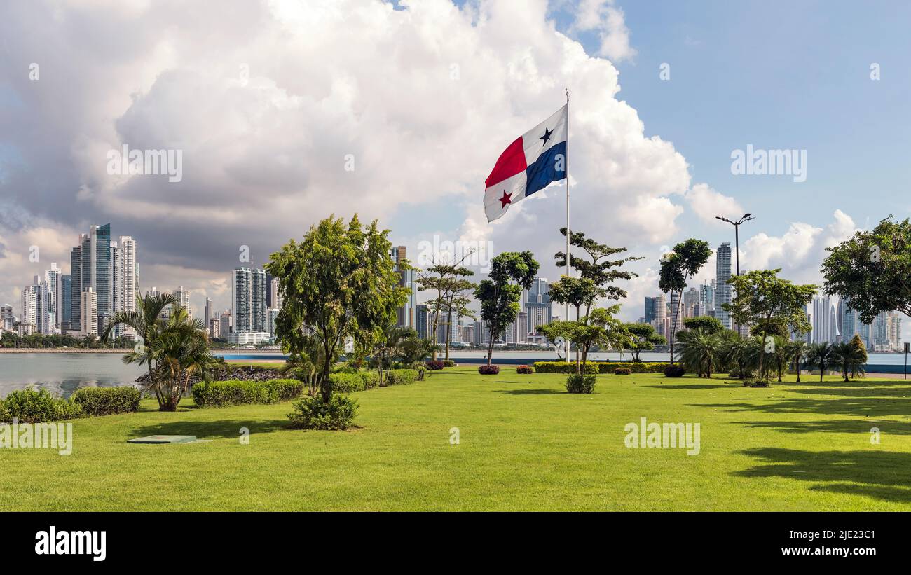 Panama City, Panama - October 29, 2021: Monument of the Flag of Panama and the skyscrapers by the shores of Panama Bay in Panama City. Stock Photo