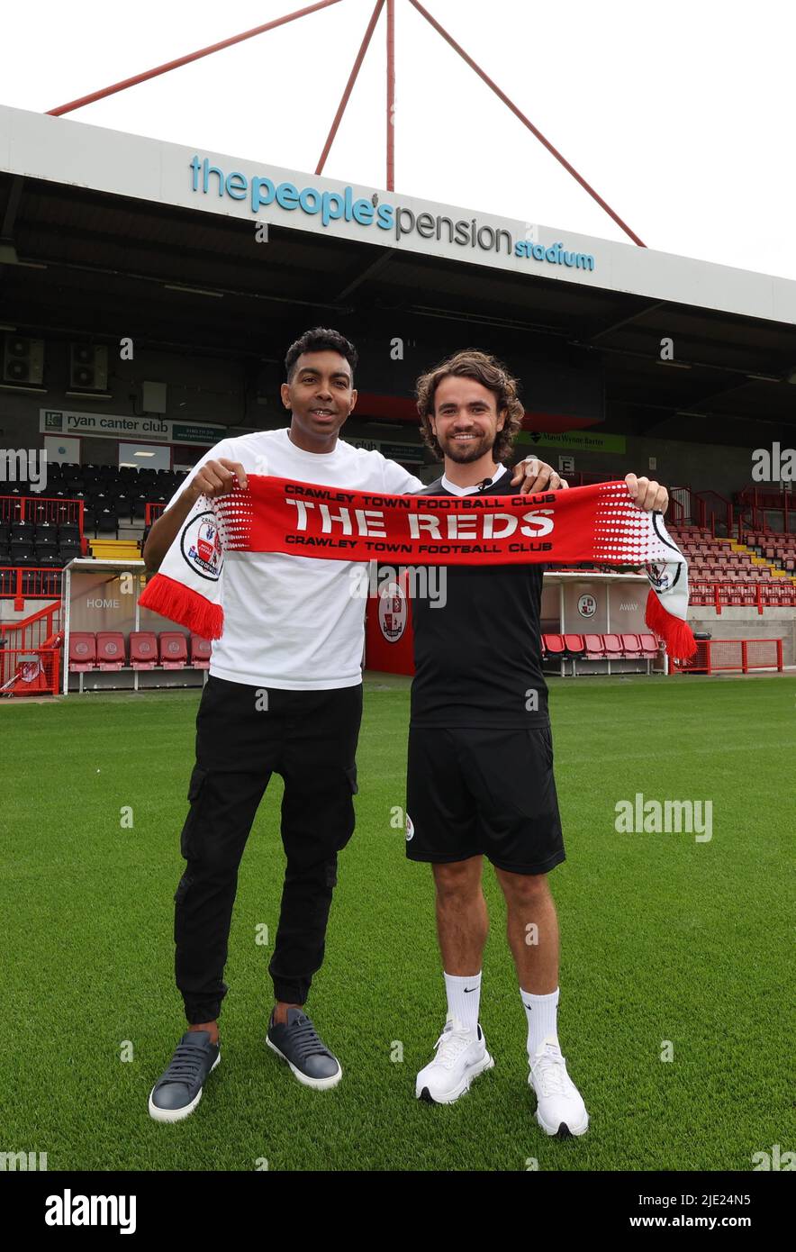 Crawley, UK. 24th June, 2022. Crawley Town Football Club new signing Dominic Telford with manager Kevin Betsy at the Broadfield Stadium in Crawley. Credit: James Boardman/Alamy Live News Stock Photo
