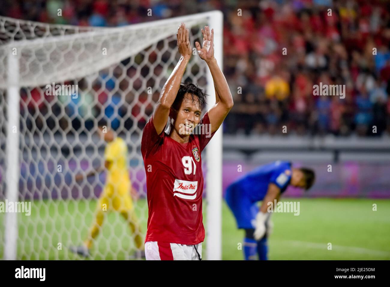 Gianyar, Bali, Indonesia. 24th June, 2022. RAHMAT SYAMSUDDIN LEO (91-left) of Bali United FC celebrates after scoring a goal. A match from the Asian Football Confederation (AFC) Cup 2022 group G of South East Asia group qualification between Bali United FC from Indonesia and Kedah Darul Aman from Malaysia at I WAYAN DIPTA stadium ended with a 2-0 victory for Bali United FC. (Credit Image: © Dicky Bisinglasi/ZUMA Press Wire) Stock Photo