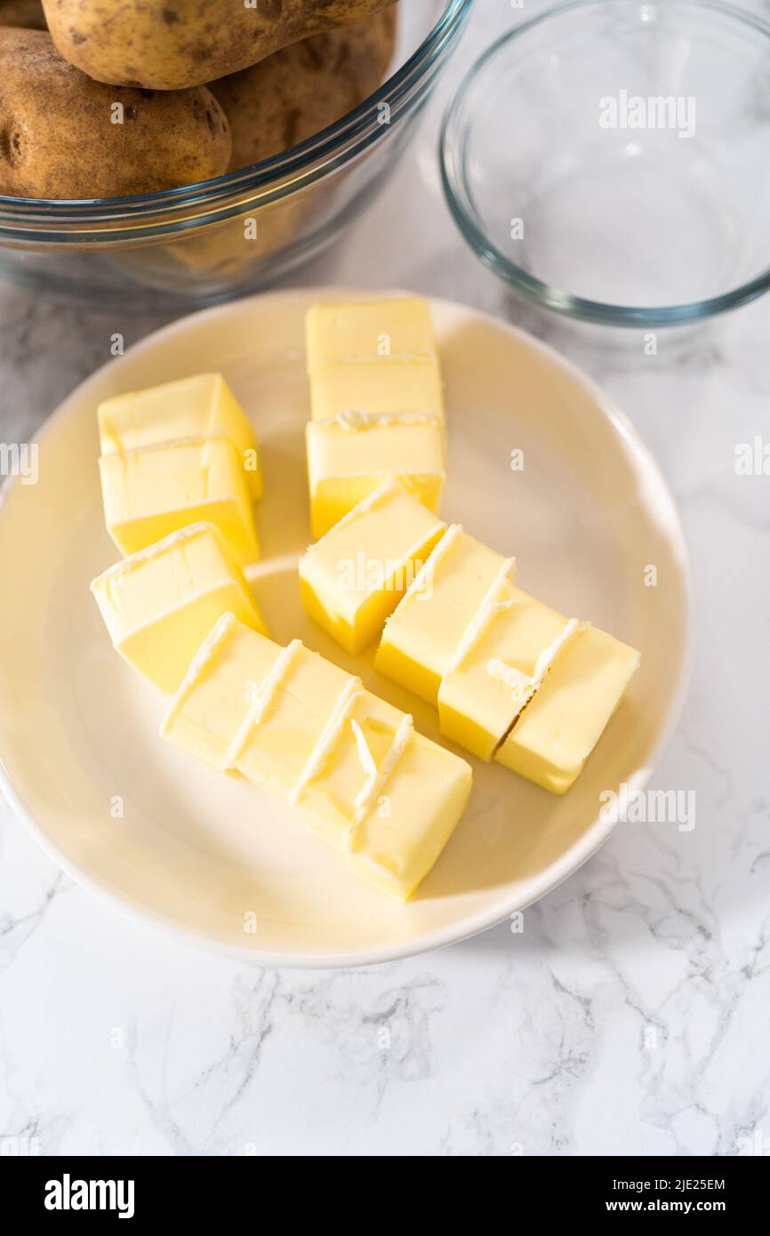 Mashed potatoes. Measured ingredients in glass mixing bowls to prepare