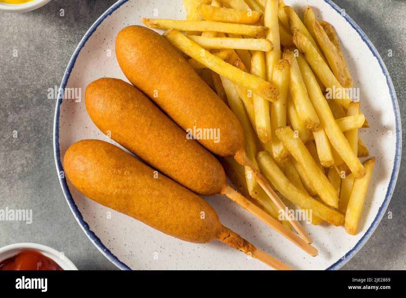 Homemade Breaded Beef Corndogs with French Fries Stock Photo Alamy