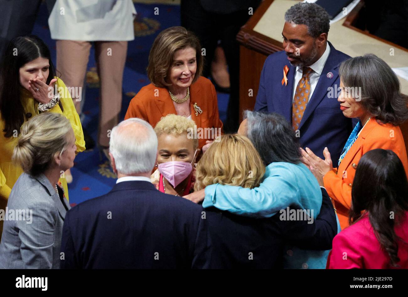 U.S. Speaker of the House Nancy Pelosi (D-CA) celebrates along with U.S. House of Representatives Democrats after passing of the 'Bipartisan Safer Communities Act' gun safety legislation already passed by the U.S. Senate during a final vote in the House Chamber on Capitol Hill in Washington, June 24, 2022.  REUTERS/Jim Bourg Stock Photo