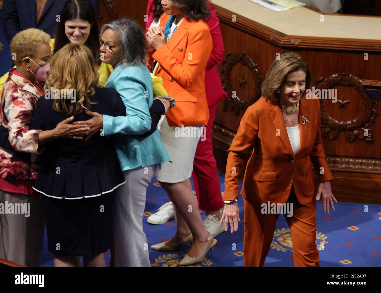 U.S. Speaker of the House Nancy Pelosi (D-CA) celebrates along with U.S. House of Representatives Democrats after passing of the 'Bipartisan Safer Communities Act' gun safety legislation already passed by the U.S. Senate during a final vote in the House Chamber on Capitol Hill in Washington, June 24, 2022.  REUTERS/Jim Bourg Stock Photo