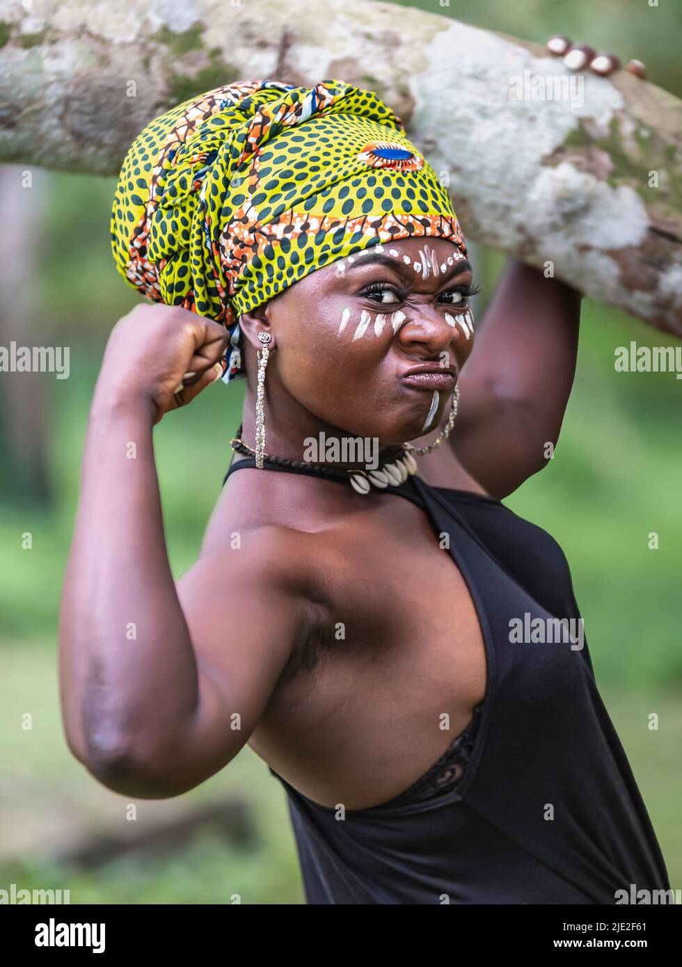 African woman shows that she is strong in the jungles of Ghana Stock Photo
