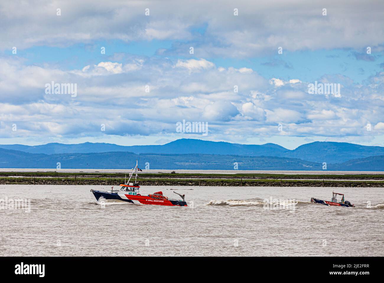 Canadian government Spill Response vessel patrolling the Fraser River estuary near Steveston British Columbia Canada Stock Photo