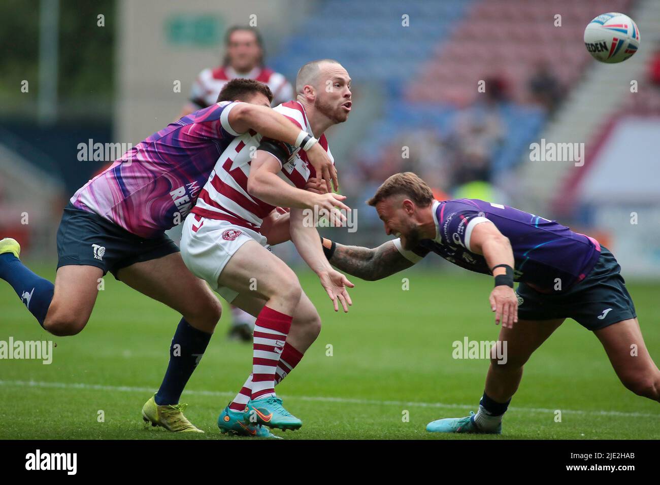 Wigans Liam Farrell throws a pass during the Betfred Super League match between Wigan and Toulouse at the DW Stadium, Wigan on 24 June 2022. Photo by Simon Hall. Editorial use only, license required for commercial use. No use in betting, games or a single club/league/player publications. Credit: UK Sports Pics Ltd/Alamy Live News Stock Photo