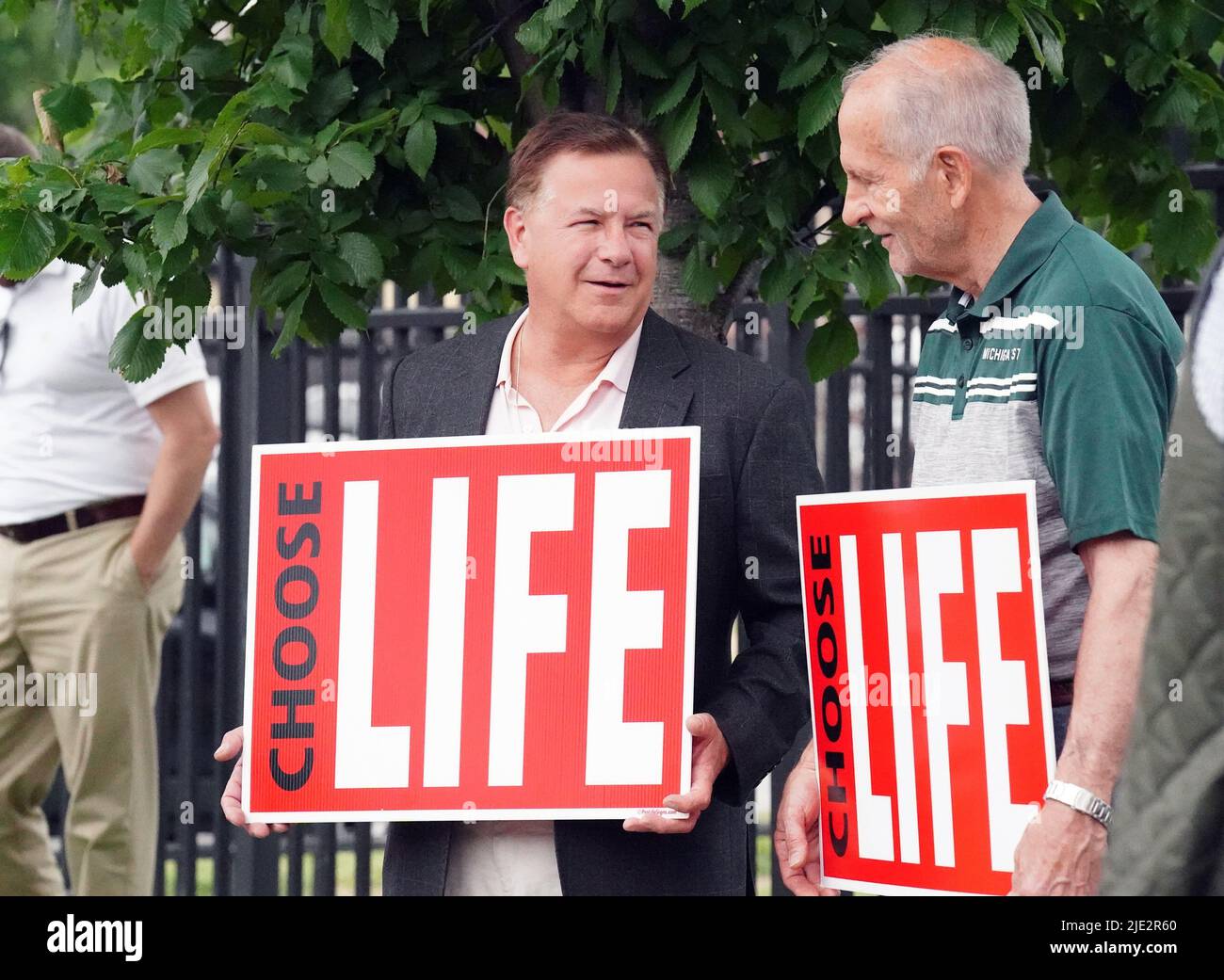 St. Louis, United States. 24th June, 2022. Republican U.S. Senate candidate for Missouri Mark McClosky (L) talks with anti-abortion activists outside of Planned Parenthood hours after the Supreme Court's decision overturning the 1973 Roe v. Wade ruling in St. Louis, Missouri on Friday, June 24, 2022. Missouri Gov. Mike Parson signed a proclamation on June 24, 2022 effectively ending abortion in the state. Photo by Bill Greenblatt/UPI Credit: UPI/Alamy Live News Stock Photo