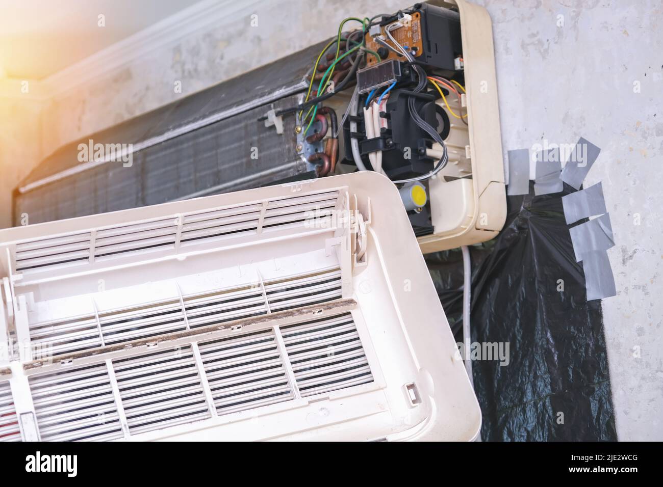 Mold and dust on the air conditioner body. Maintenance and cleaning of