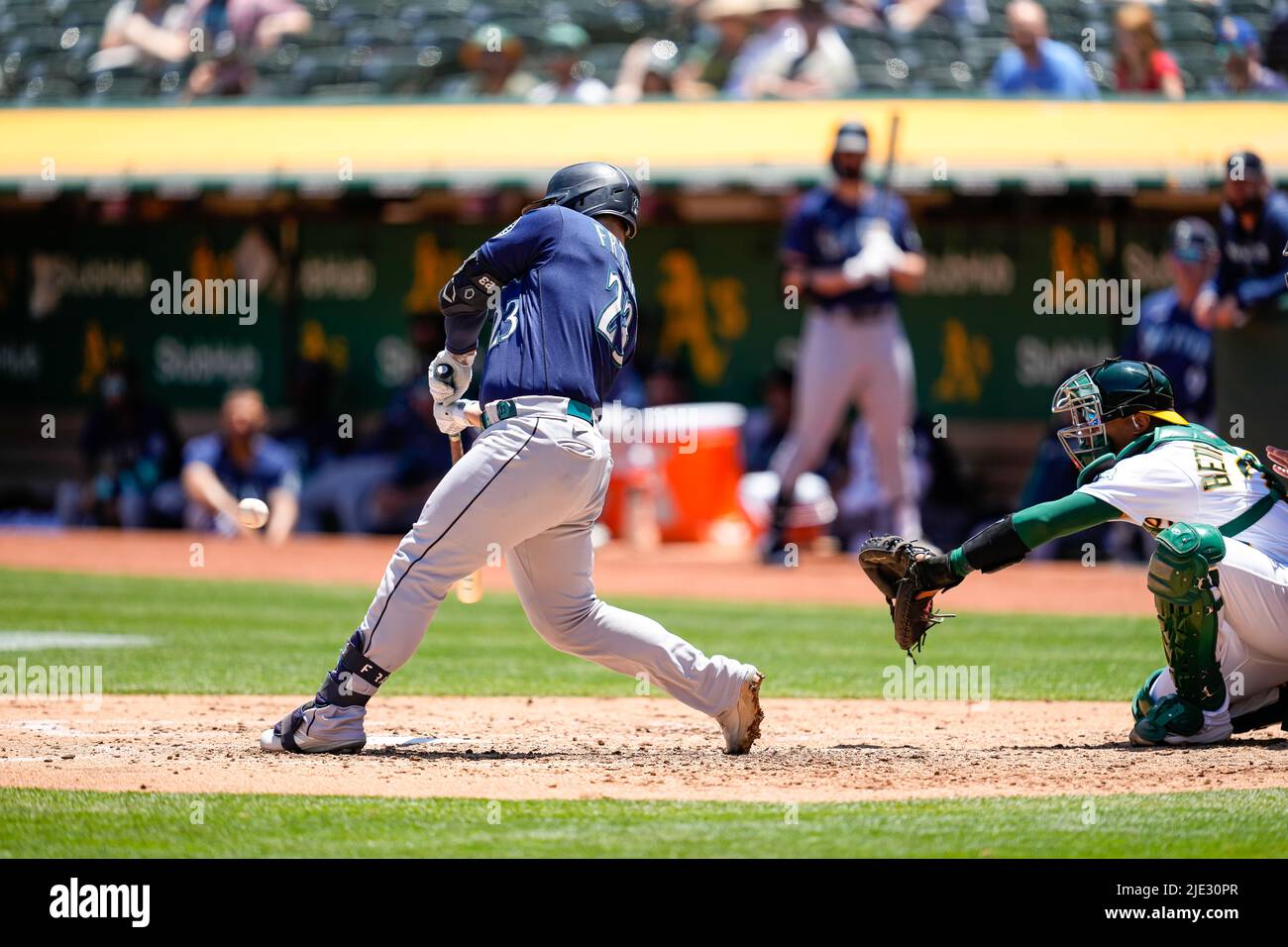 Seattle Mariners' Ty France (23) and Kyle Seager celebrate after a baseball  game against the Houston