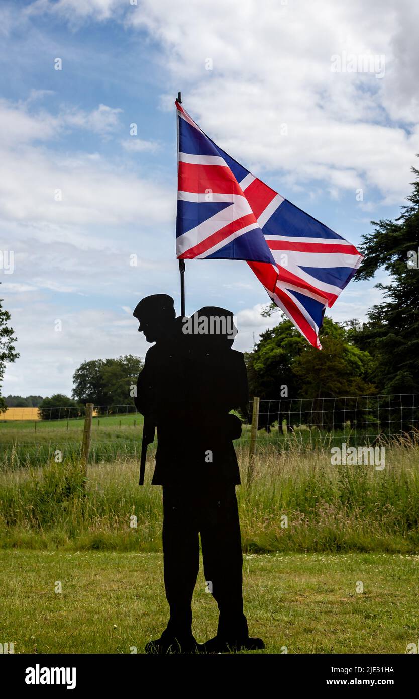 Standing With Giants memorial installation to the dead of the Falklands War - soldire silhouette with Union Jack, in Thoresby Park, Nottinghamshire, U Stock Photo