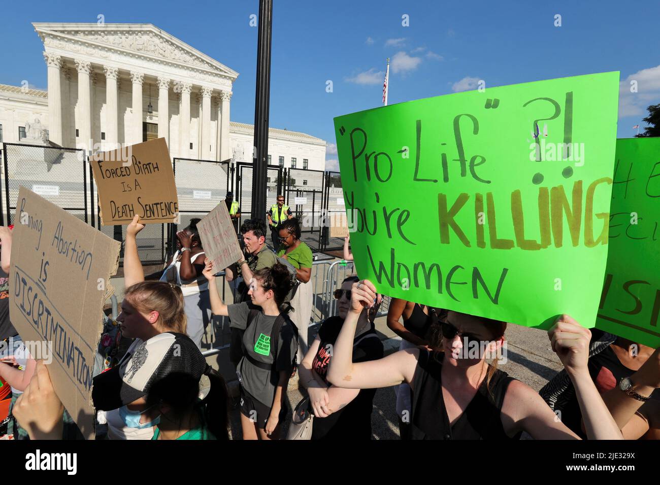 Abortion rights demonstrators protest outside the United States Supreme Court as the court rules in the Dobbs v Women's Health Organization abortion case, overturning the landmark Roe v Wade abortion decision, in Washington, DC, U.S., June 24, 2022. REUTERS/Jim Bourg Stock Photo