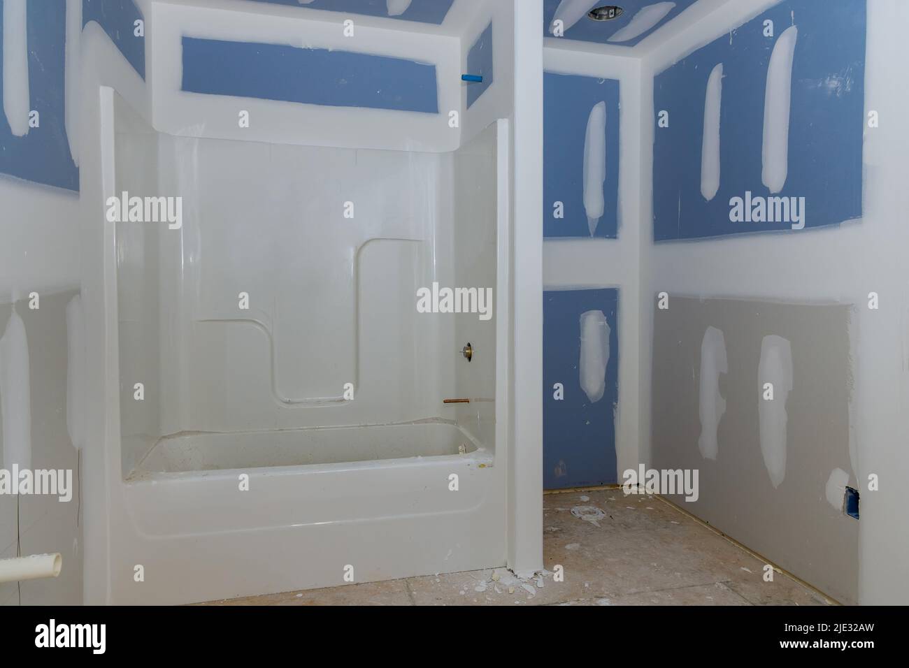 Construction of a bathroom with a bathtub for the new home Stock Photo